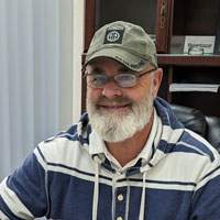 Portrait of John Hardy General Manager of Barefoot Grass Lawn Care