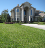 House surrounded by beautiful St Augustine Lawn
